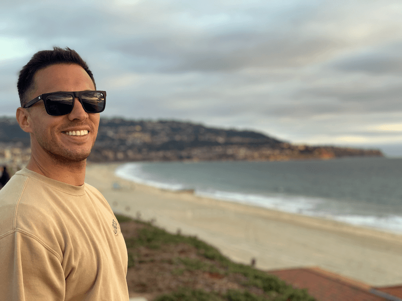 David Villegas smiling at the beach.